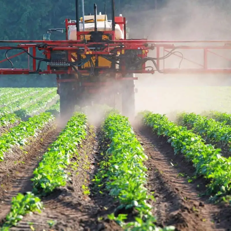 tractor spraying pesticides